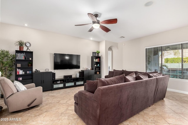 living room with ceiling fan