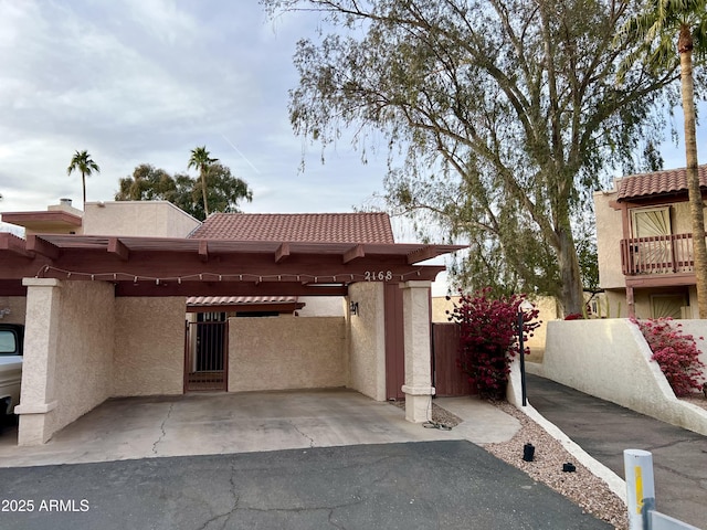 exterior space with a carport