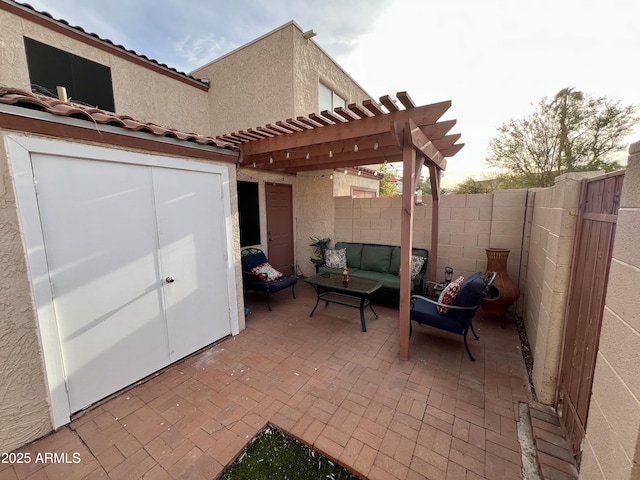 view of patio with an outdoor hangout area and a pergola