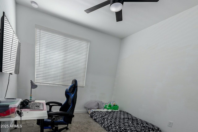 home office featuring ceiling fan and carpet flooring