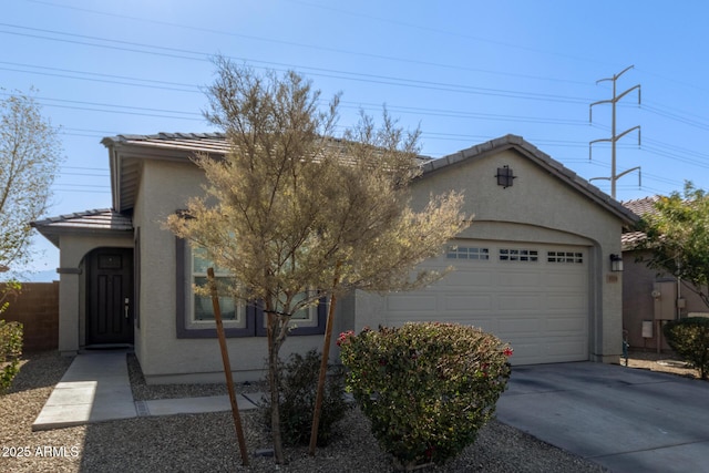 view of front of home with a garage