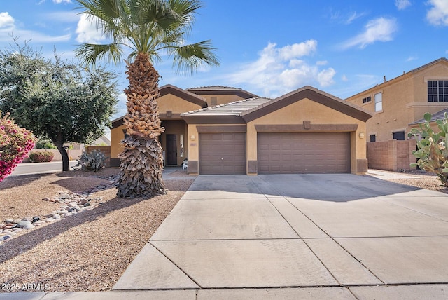 view of front of property with a garage