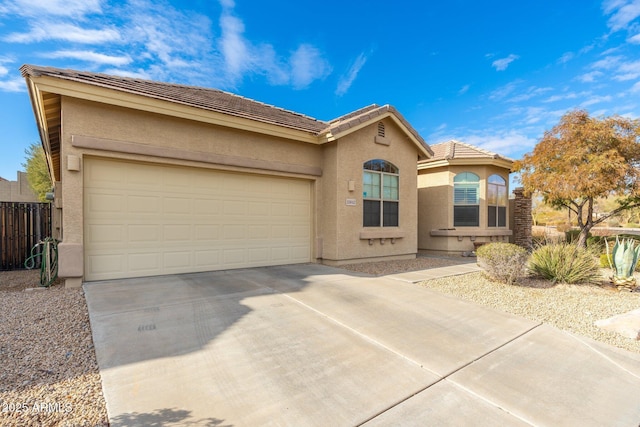 view of front of property with a garage