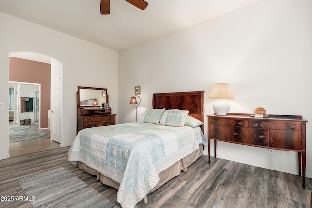 bedroom with ceiling fan and dark hardwood / wood-style flooring