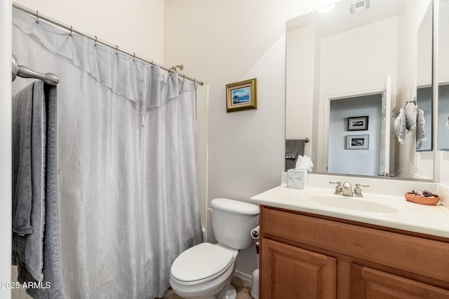 full bathroom featuring shower / bathtub combination with curtain, vanity, and toilet