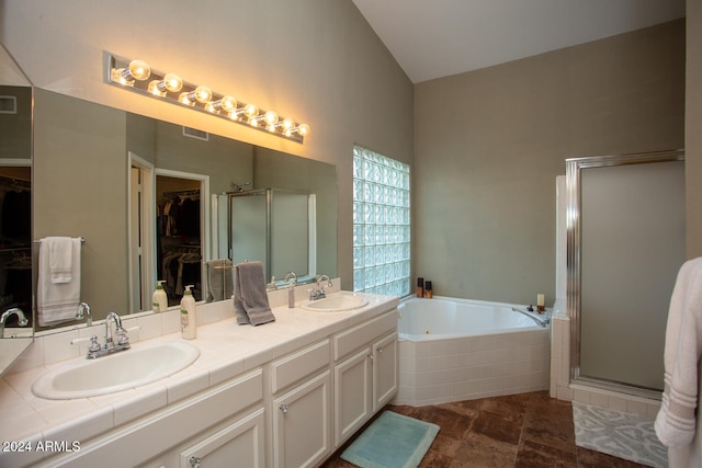 bathroom with vanity and plus walk in shower