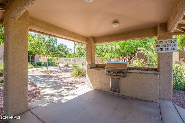 view of patio / terrace featuring exterior kitchen and area for grilling