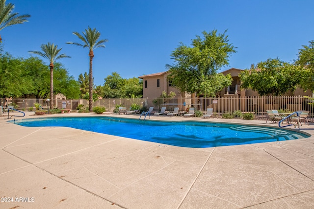 view of swimming pool featuring a patio