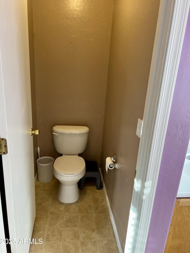 bathroom featuring toilet