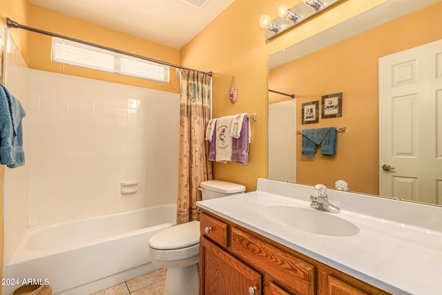 full bathroom with tile patterned flooring, vanity, toilet, and shower / tub combo