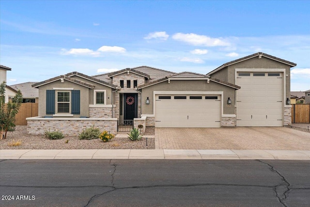 view of front of property with a garage