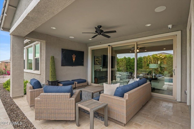 view of patio / terrace featuring an outdoor living space and ceiling fan