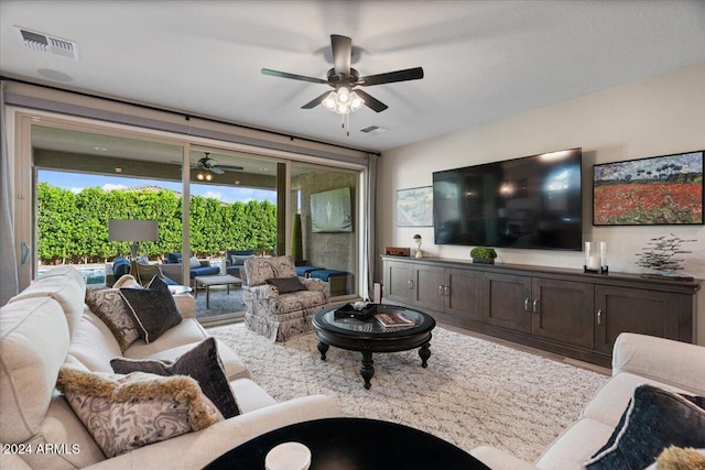 living room featuring ceiling fan