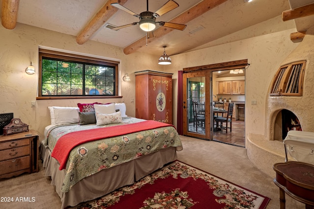 bedroom with access to exterior, ceiling fan, light colored carpet, and vaulted ceiling with beams