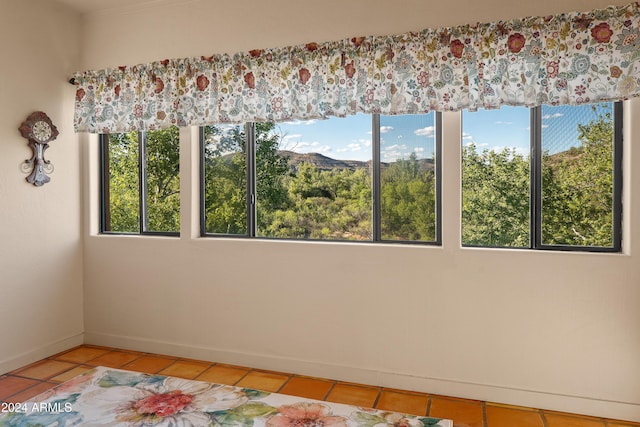 view of tiled spare room