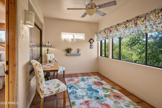 bathroom with tile patterned floors and ceiling fan