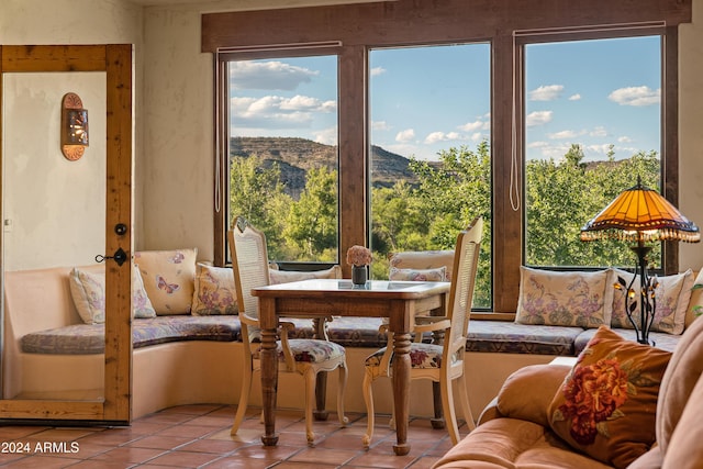 sunroom with a mountain view