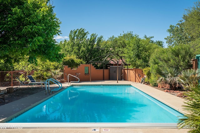 view of swimming pool with a gazebo and a patio