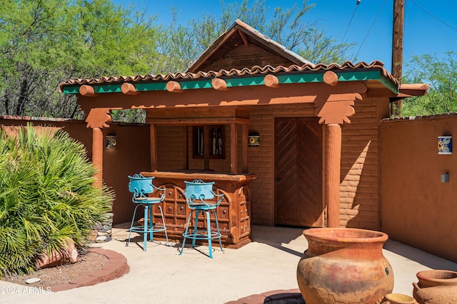 view of patio with a bar