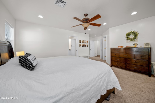 bedroom with ceiling fan and light colored carpet