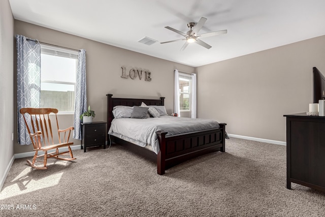 bedroom featuring carpet floors, visible vents, ceiling fan, and baseboards