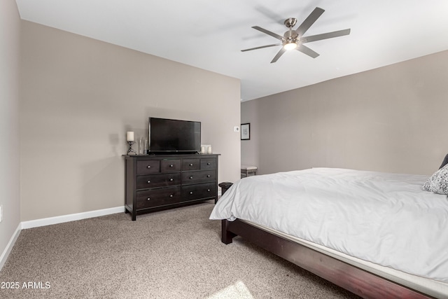 bedroom featuring carpet, baseboards, and ceiling fan