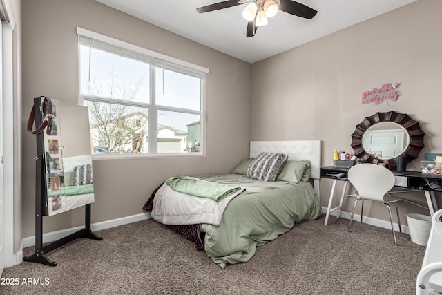 bedroom with carpet floors, ceiling fan, and baseboards