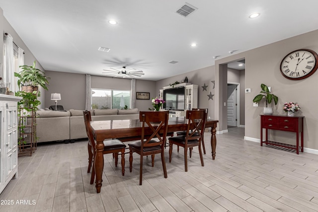 dining space with light wood-style floors, recessed lighting, visible vents, and ceiling fan