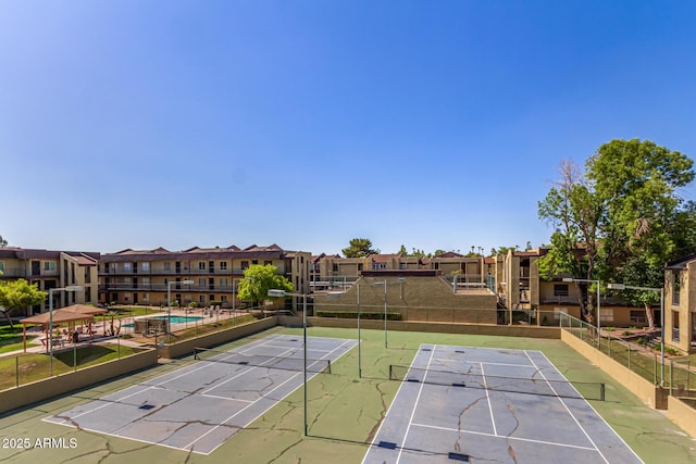 461 W Holmes Ave Unit 323, Mesa, AZ 85210 - surrounding community with a tennis court, a residential view, and uncovered parking
