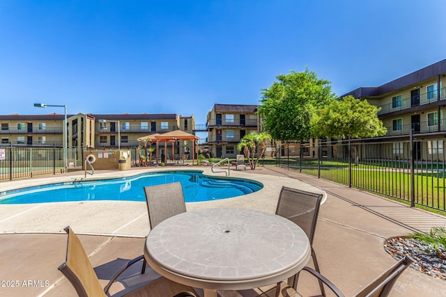 461 W Holmes Ave Unit 323, Mesa, AZ 85210 - community pool with a patio and a residential view
