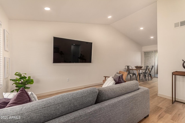 461 W Holmes Ave Unit 323, Mesa, AZ 85210 - living room with recessed lighting, light wood-type flooring, and lofted ceiling