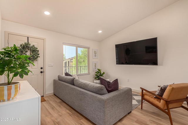 461 W Holmes Ave Unit 323, Mesa, AZ 85210 - living area featuring vaulted ceiling, light wood-style floors, and recessed lighting