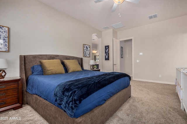 bedroom featuring ceiling fan and light carpet