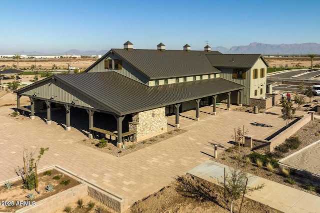 exterior space featuring a mountain view