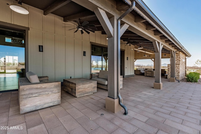 view of patio / terrace featuring ceiling fan