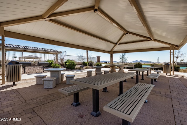 view of patio / terrace with a gazebo and outdoor dining space