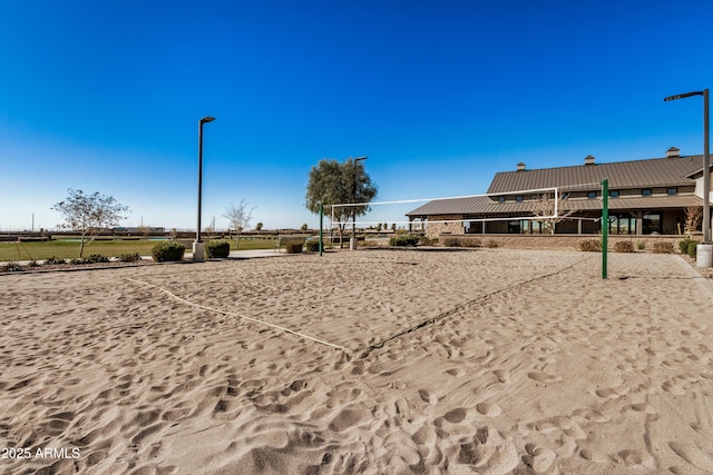 view of property's community featuring volleyball court