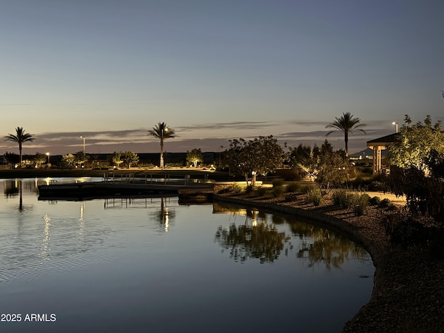 view of water feature with a dock