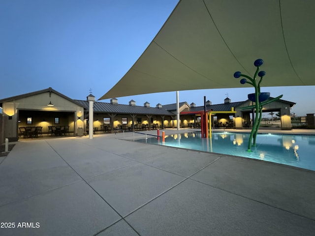 pool with a patio area