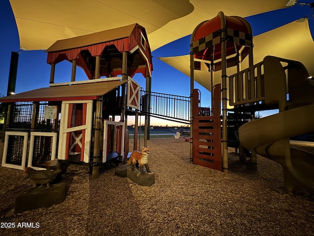 view of playground at dusk