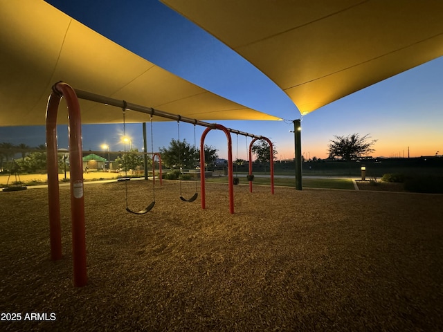 view of playground at dusk