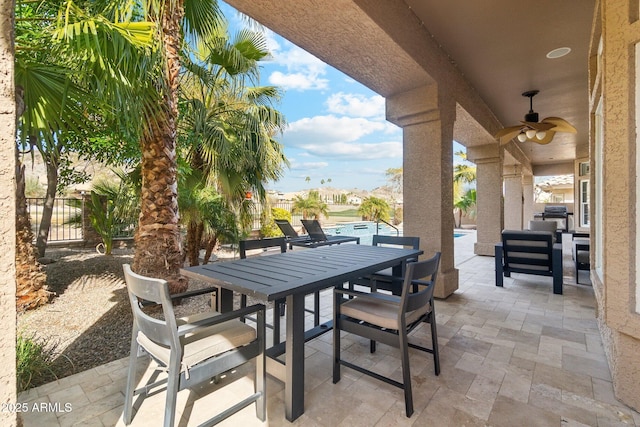 view of patio / terrace with a pool, an outdoor living space, grilling area, and ceiling fan