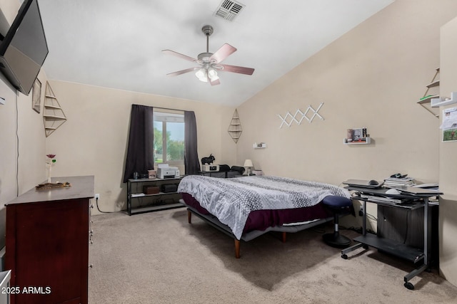 bedroom with visible vents, vaulted ceiling, light carpet, and ceiling fan