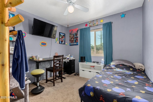 bedroom featuring light carpet and ceiling fan