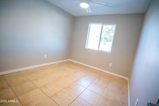 7136 W Cheryl Dr, Peoria, AZ 85345 - empty room featuring light tile patterned flooring, baseboards, and a ceiling fan