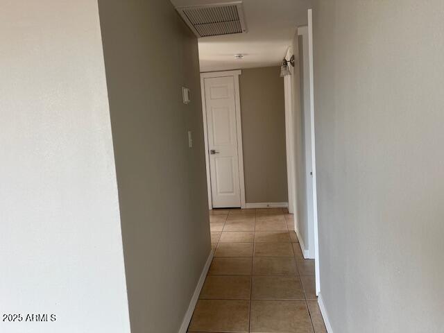 7136 W Cheryl Dr, Peoria, AZ 85345 - hall with baseboards, visible vents, and tile patterned floors