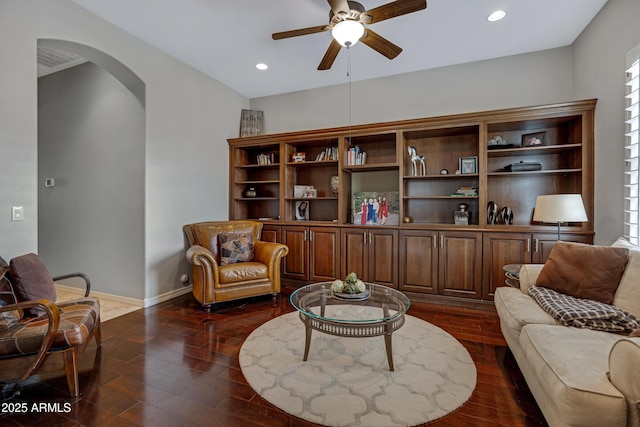 6694 S Banning St, Gilbert, AZ 85298 - living room featuring recessed lighting, dark wood finished floors, a ceiling fan, arched walkways, and baseboards