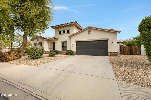 6694 S Banning St, Gilbert, AZ 85298 - mediterranean / spanish house featuring a gate, stucco siding, a tile roof, driveway, and a garage