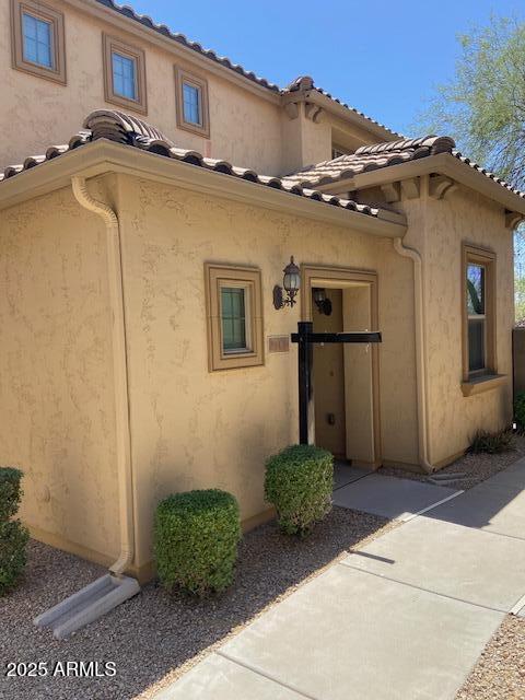 21136 N 36th Pl, Phoenix, AZ 85050 - property entrance featuring stucco siding and a tile roof