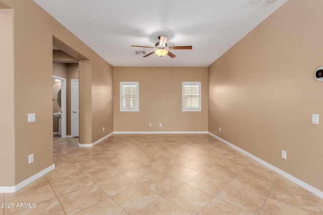 21136 N 36th Pl, Phoenix, AZ 85050 - unfurnished room featuring a ceiling fan and light tile patterned flooring